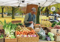 Dan Kent of Kent Family Growers of Lisbon, NY, at a farmers market in Northern New York. Photo: courtesy of Kent Family Growers